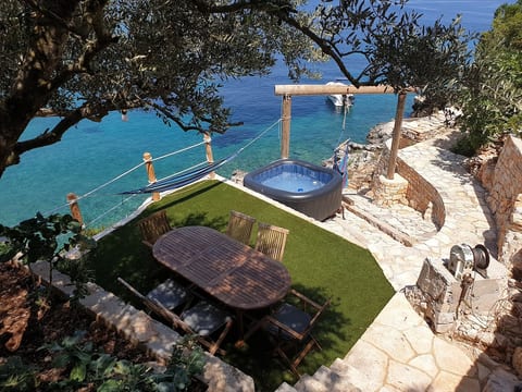 Remote beach house, just above the sea. image 3