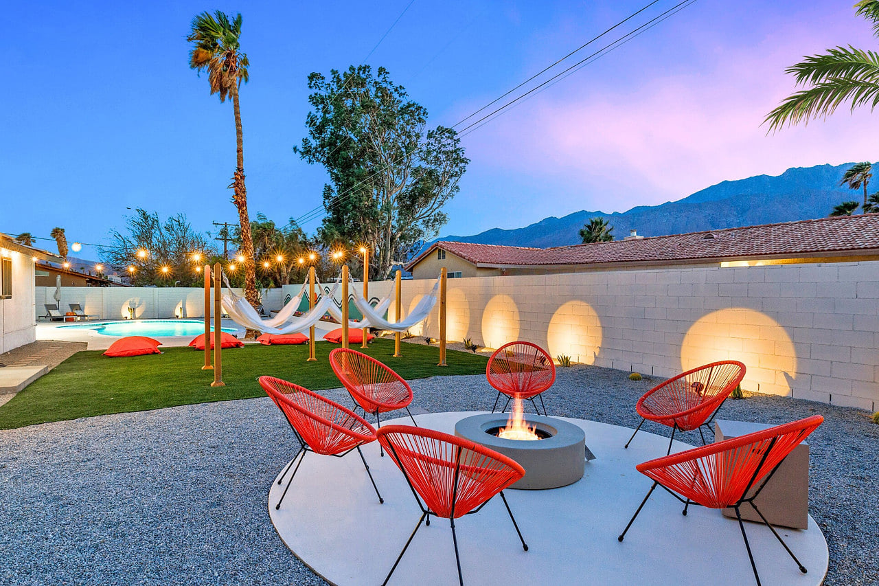 Backyard lounge w/ sculptural seating sets the scene for sunset conversations under desert skies.