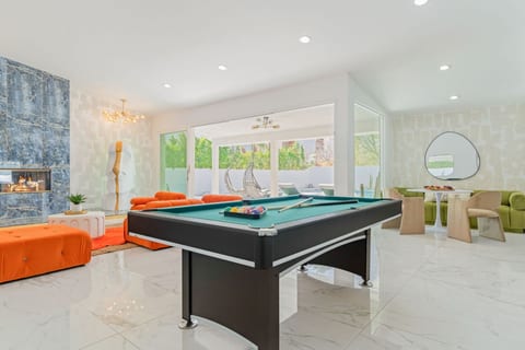 Game-ready hangout w/ pool table, stylish decor, and plenty of space for friendly competition.