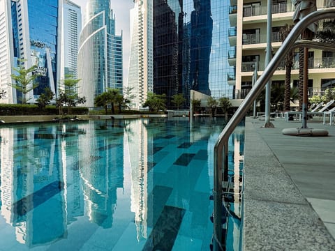 Near Metro | 1BR | Pool & Balcony with Canal Views