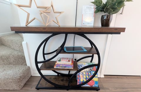 Kids will stay happily entertained with a selection of board games, books, and a fun writing tablet.