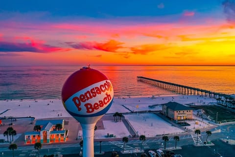 This is why you came. A fiery Pensacola Beach sunset paints the sky just 15 minutes from your door — the #1 rated beach in the USA. Stroll the pier, feel the warm sand, and let the Gulf Coast work its magic on your whole crew