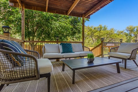 Outdoor seating on deck in backyard