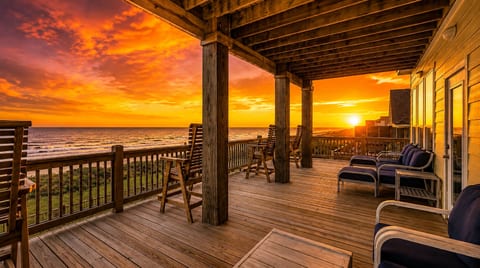 Spacious oceanfront deck with sunset views and relaxing lounge seating