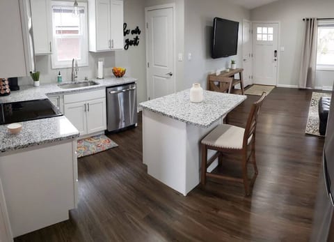 Our open concept eat-in kitchen has all the necessary appliances and utensils!