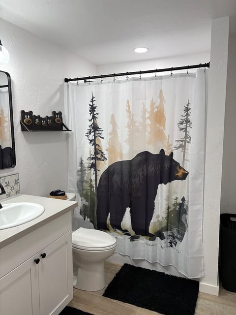 Even the bathroom tells a story. A majestic black bear roams through misty pines on your shower curtain while you decompress after a day exploring Sequoia. Clean, fully remodeled, and dripping with mountain personality. Tub and shower combo.