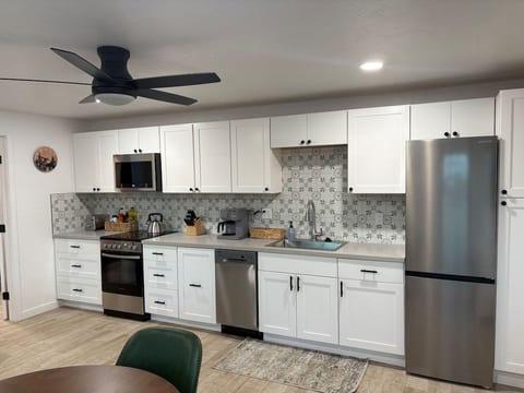 Fuel up before hitting Sequoia's trails — this fully remodeled kitchen has everything you need. Stainless appliances, quartz counters, and a Keurig ready to go. Cook in, or walk next door to dinner. Your basecamp never looked this good.
