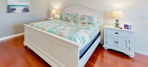 Master bedroom with king-sized bed.