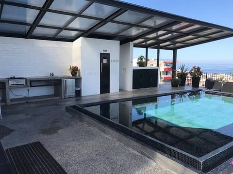 Outdoor gas grill and kitchen
