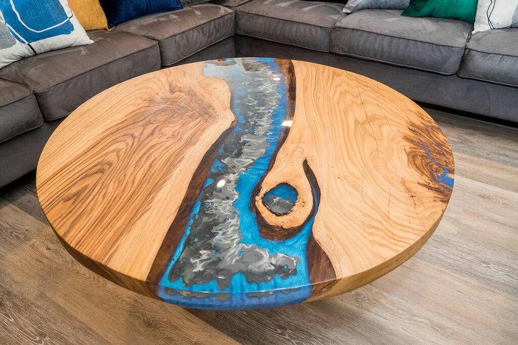 Our Custom Epoxy Coffee Table adds a mesmerizing fusion of design and functionality that transforms your coffee breaks into moments of wonder. - Season 4 Escape - McGaheysville