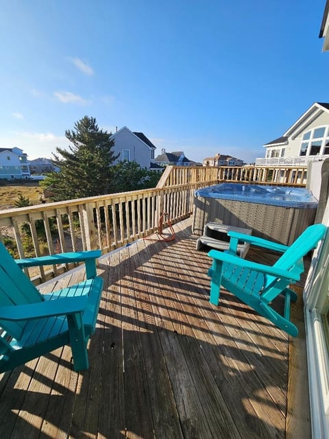 Upper oceanside deck with hot tub.