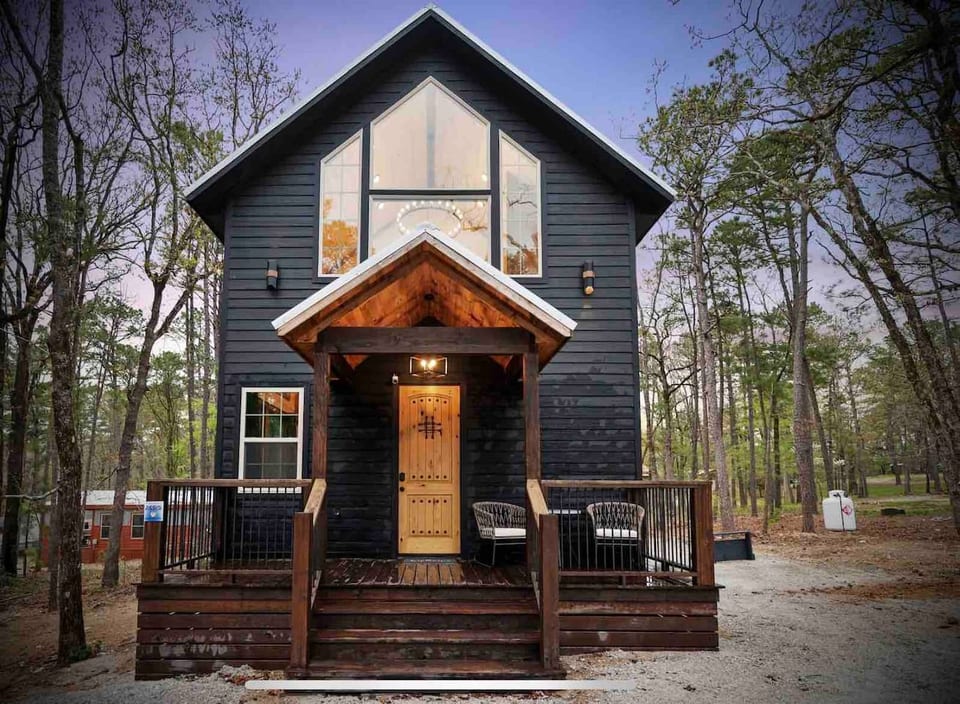 Relax in your cabin in the woods and cozy home away from home.