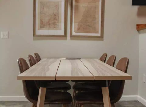 Gather around the table with your friends and family for dinner or games. There are 2 additional chairs in the basement so everyone has a seat!