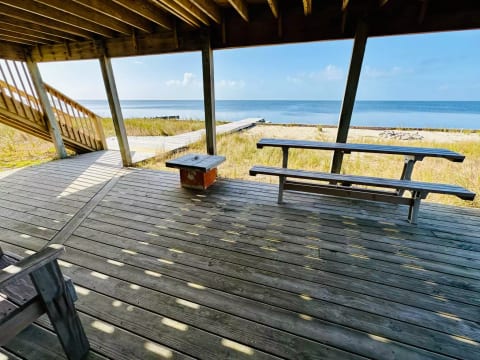 Ground level shaded deck, great place to escape the direct sun during mid-day
