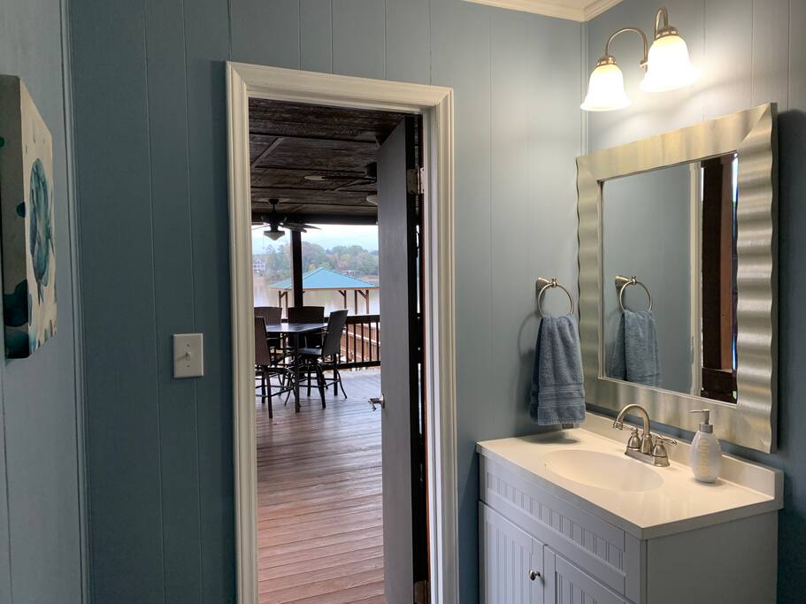 There’s a full bathroom off the covered porch. This bathroom gets used a lot during the summer. - Camm’s Lakeside Retreat (close to Charlotte) - Belmont