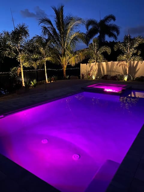 Pool & outdoor area at night.