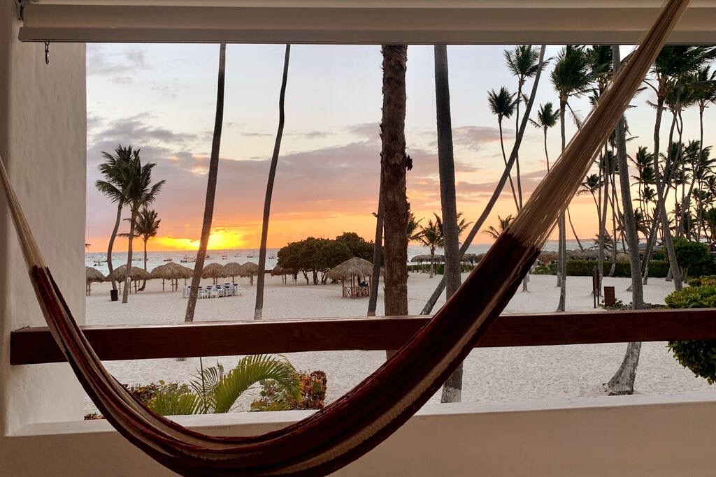 First one up gets the hammock! Catch the beautiful sunrise from your private beachfront view. - Luxury Condo with Stunning views, Private Beach - Punta Cana