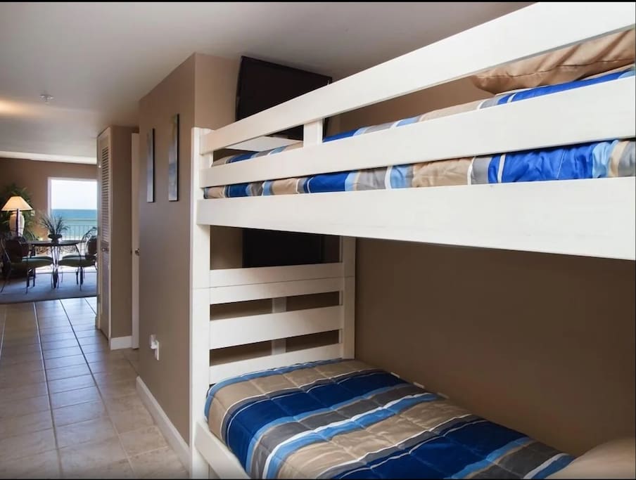Bunk Beds with a Streaming TV on the top bunk and a DVD player on the bottom bunk TV