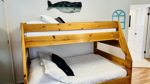 Bunk beds (a full and a twin) features an ocean theme