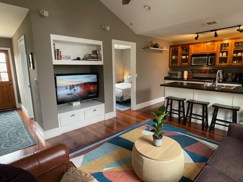 Open and bright living, kitchen, and bedroom.