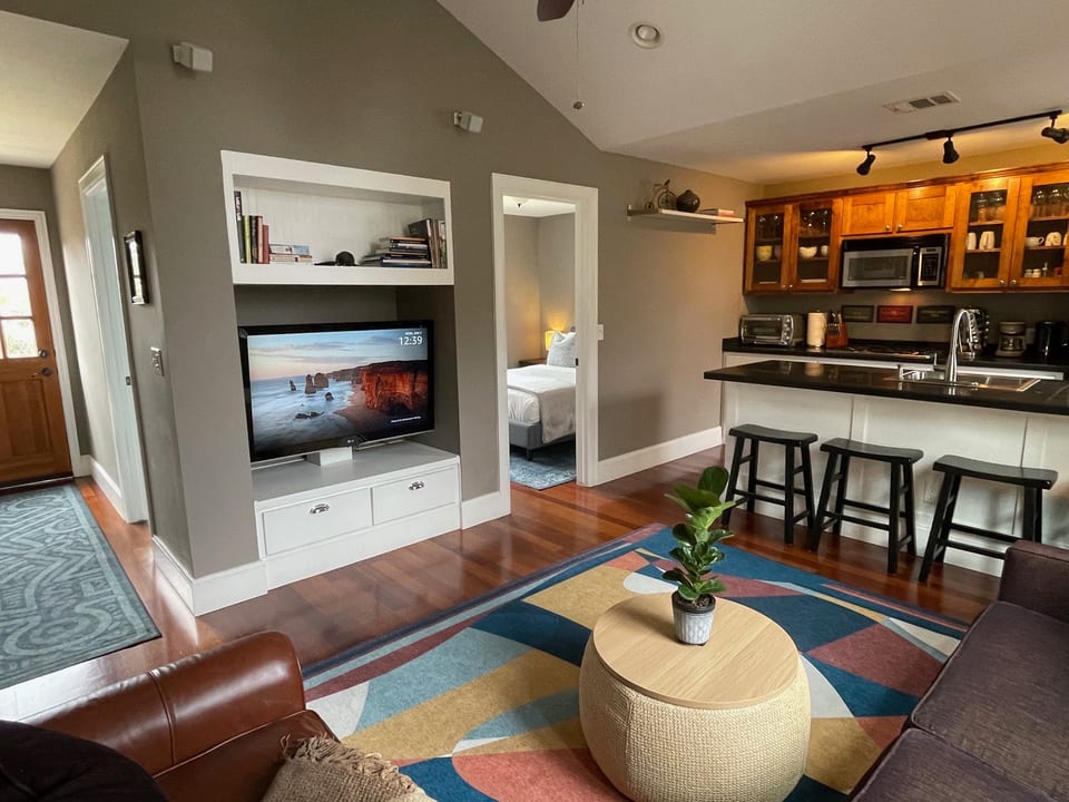 Open and bright living, kitchen, and bedroom.