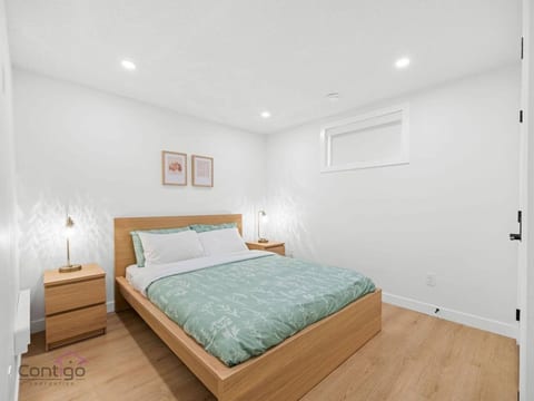 Relax and recharge in our cozy queen bedroom.