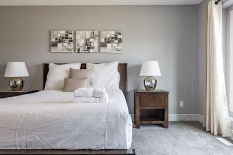 Relax in a cozy bedroom with a comfortable double bed. Perfect for a restful night after exploring the area.