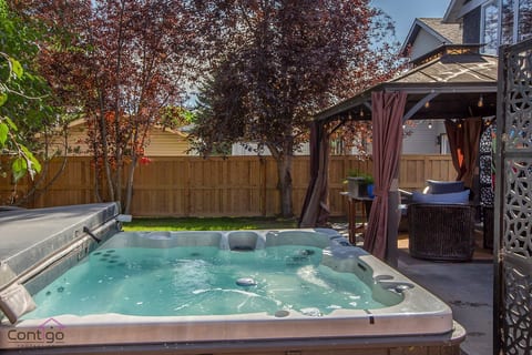 Soak & unwind in your private outdoor hot tub under the stars!