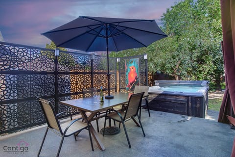 Enjoy the ultimate backyard retreat with a private hot tub!