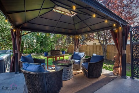 Evenings by the fire—gather, relax, and stay warm around the outdoor fire table.