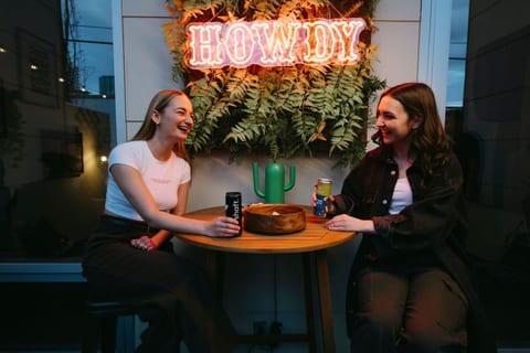 Cozy outdoor seating with charming decor. The perfect spot to relax and enjoy quiet conversation with friends or family.