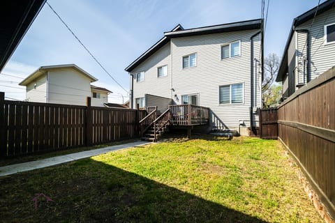Enjoy the outdoors! Deck and spacious backyard ready for your stay.