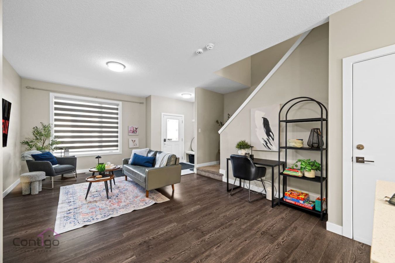 Perfect spot to unwind or plan your day with comfortable seating, ample natural light, and a dedicated workspace.