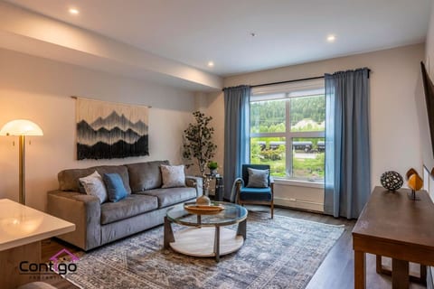 Settle into comfort in our stylish living area. Featuring plush seating, a smart TV, and natural light, it's the perfect spot to recharge.