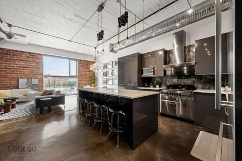 Sleek kitchen with island seating and open-concept design