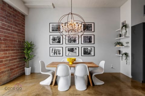 Elegant dining area with seating for six and modern style.