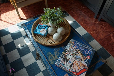 Fun touches throughout! Sports-themed magazines and trivia games add playful character to this centrally located loft.