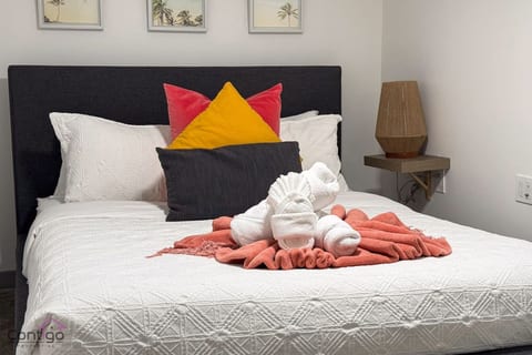 A queen-size bed ensures restful nights in a space that feels personal and inviting. Guests love the comfort built into every detail.