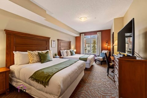 Two queen bedroom with mountain views at 170 Kananaskis Way Canmore top rated Alberta Rockies accommodation near downtown and ski resorts