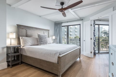 Primary King Bedroom with Entrance to Balcony and Desk