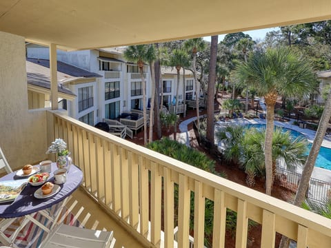 Wake Up to Sweeping Pool Views from Your Private Balcony