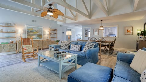 Spacious Living Room with Fresh Coastal Design & Vaulted Ceilings