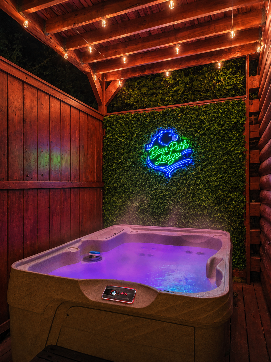 Relax in the hot tub on the lower deck overlooking the woods