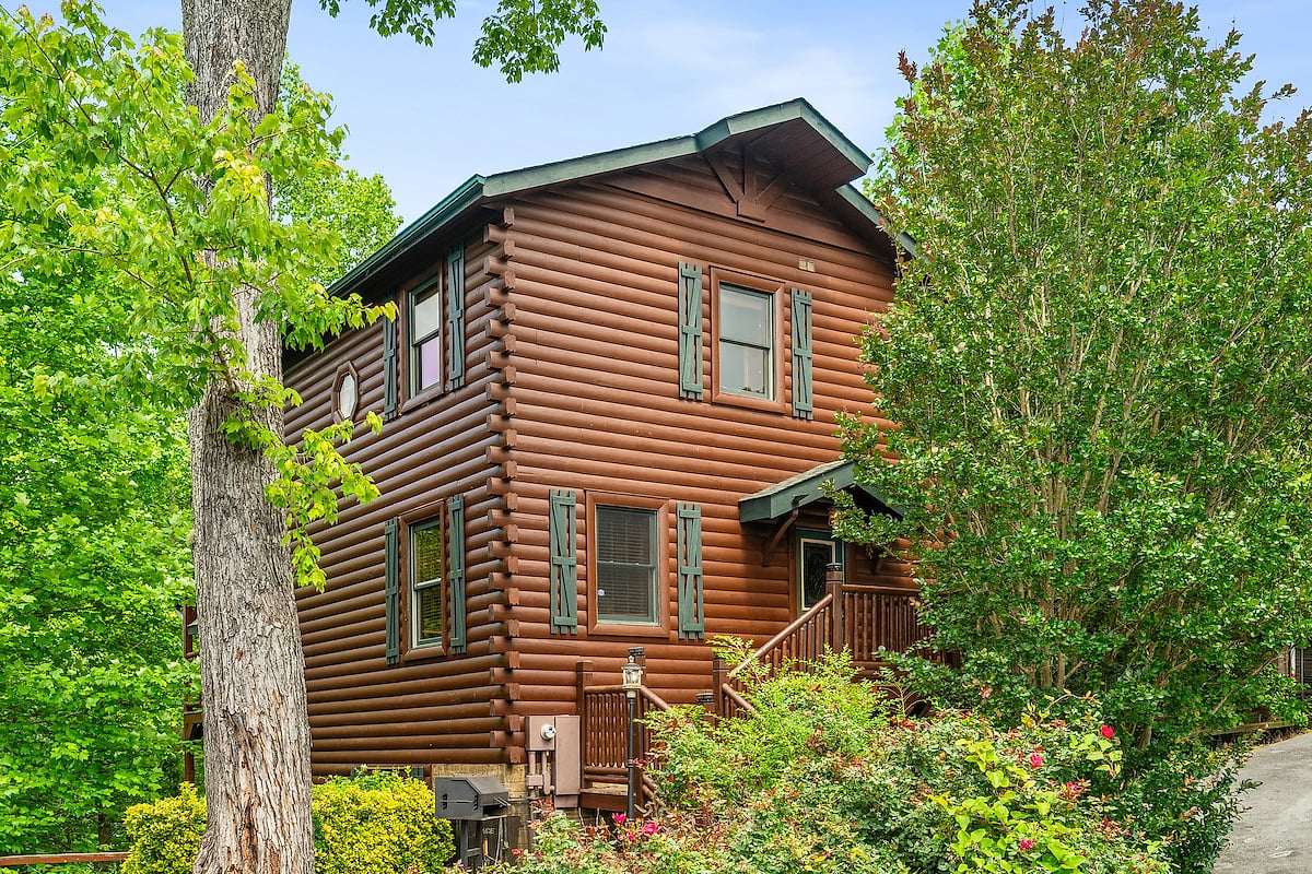 ~ Sleeps 14 | Hot Tub | Game Room | Wooded Views ~ image 1