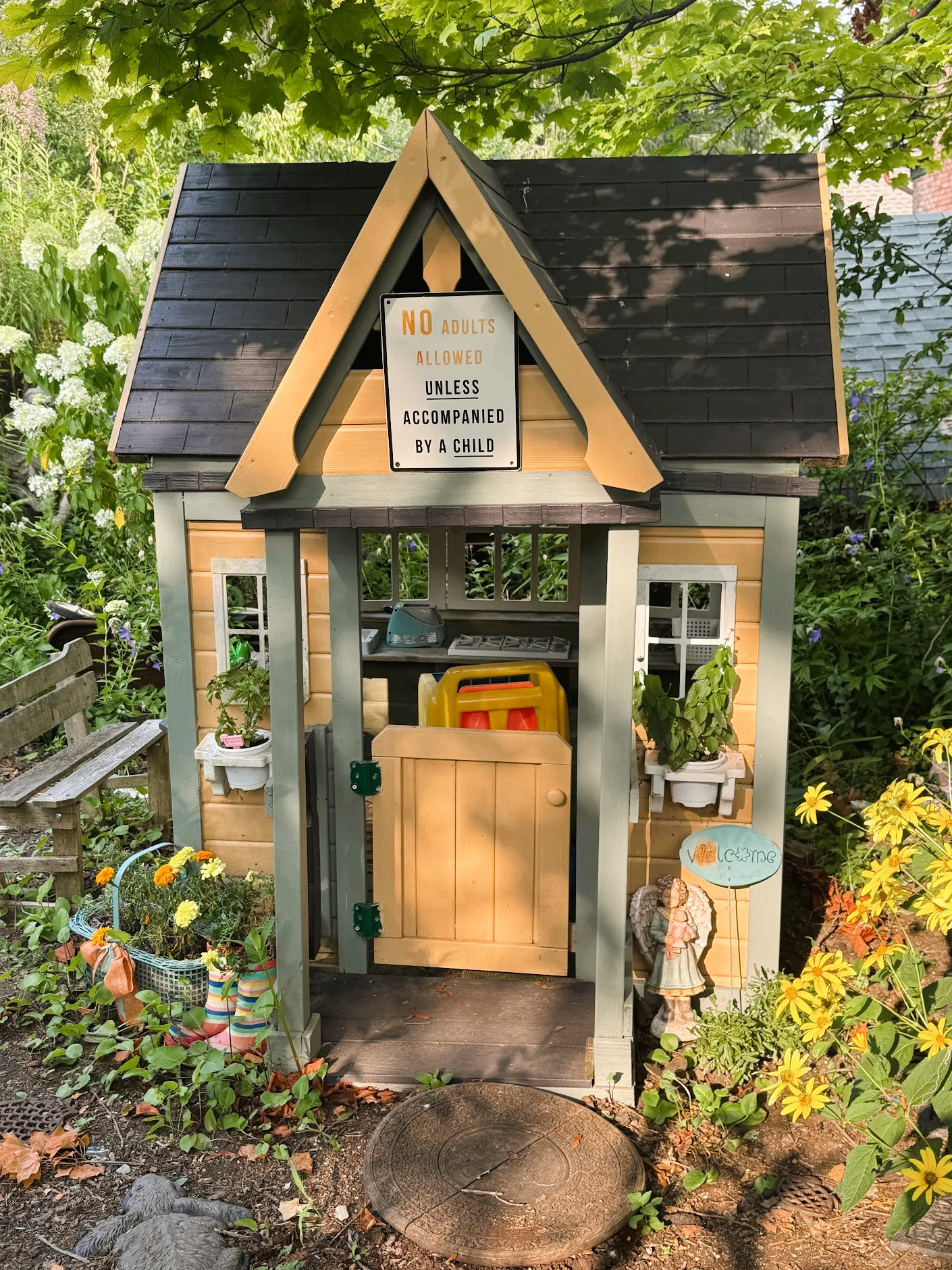 Children's playhouse available for use in owner's backyard.
