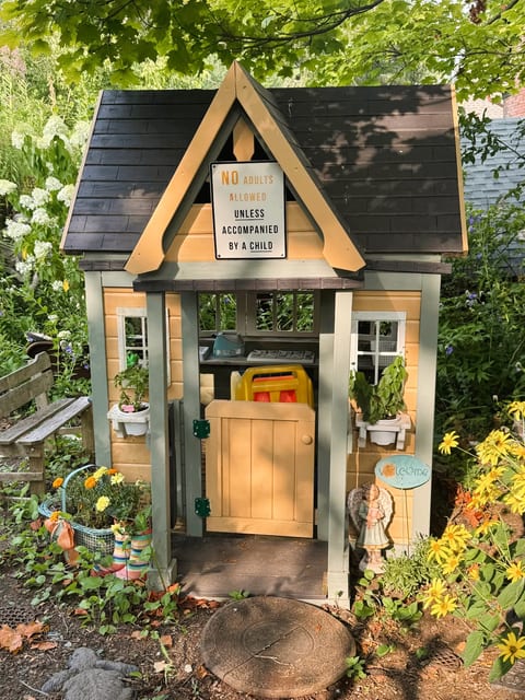 Children's playhouse available for use in owner's backyard.