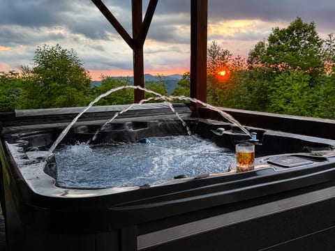 Private hot tub with sweeping Blue Ridge Mountain views, one of the best places at Mars Hill Haven to relax and watch the sunset.