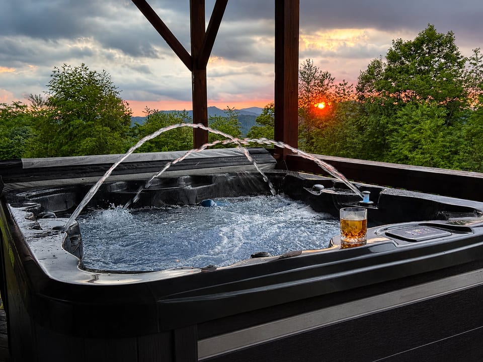 Private hot tub with sweeping Blue Ridge Mountain views, one of the best places at Mars Hill Haven to relax and watch the sunset.