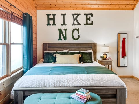 Second-floor Hike Room with a king bed, warm mountain décor and a comfortable private retreat for two guests.