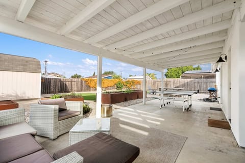 Surf Farmhouse | Hot Tub, Big Backyard, Sleeps 7!